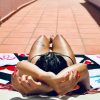 woman tanning sunbathing bikini summer